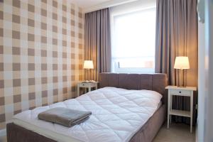 Posteľ alebo postele v izbe v ubytovaní Sea Cliff Apartment Rewal