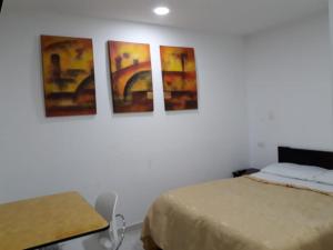 Postel nebo postele na pokoji v ubytování A Bogota On Holidays by Open - HOTEL CAS-EMBAJADA AMERICANA