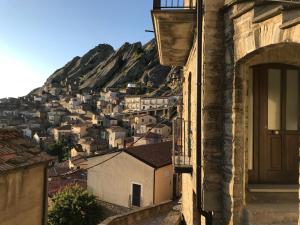 a view of a city from a building at La Pietra Verde in Pietrapertosa +10 photos