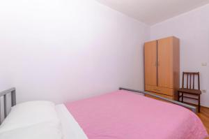 Postel nebo postele na pokoji v ubytování Apartments Katica