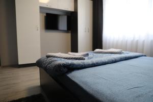 Giường trong phòng chung tại Misha