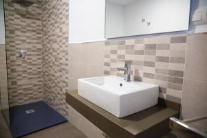 Koupelna v ubytování Hotel Salambina + 37 fotografií