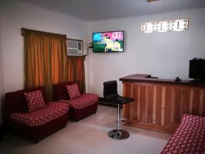 Televisyen dan/atau pusat hiburan di 8th Street Hostel +25 gambar