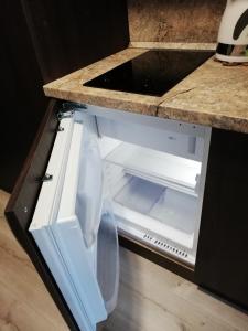 Kuchyň nebo kuchyňský kout v ubytování Apartmán Diamond