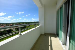 a balcony of a building with a view at Garden Sentral Hotel in Kuala Belait