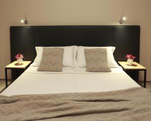 Кровать или кровати в номере Hotel Aloisi
