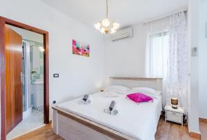 Postel nebo postele na pokoji v ubytování Studio Vijađ