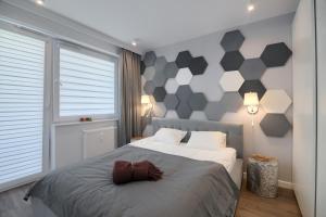 Posteľ alebo postele v izbe v ubytovaní Apartament Marina