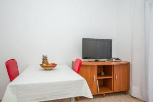 TV a/nebo společenská místnost v ubytování Apartments Macolic
