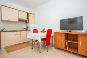 Kuchyň nebo kuchyňský kout v ubytování Apartments Macolic