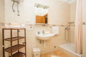 Koupelna v ubytování Apartments Macolic