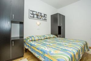 Postel nebo postele na pokoji v ubytování Apartments Macolic