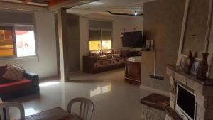 Kitchen o kitchenette sa Darcom Apartments