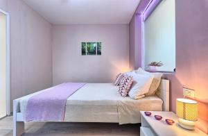 Posteľ alebo postele v izbe v ubytovaní Villa Anadi + 37 fotografií