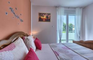 Posteľ alebo postele v izbe v ubytovaní Villa Anadi