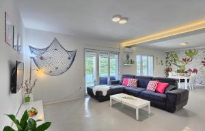 Posedenie v ubytovaní Villa Anadi