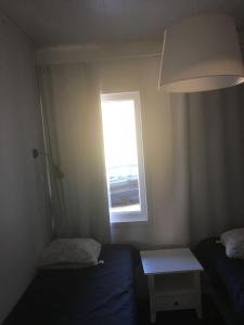 Postel nebo postele na pokoji v ubytování Paljakka Villas