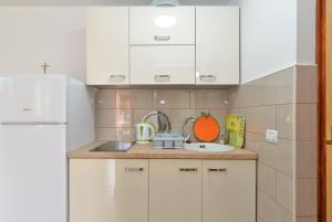 Kuchyňa alebo kuchynka v ubytovaní Apartments Josip 1713