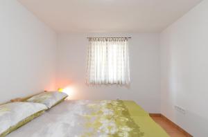 Posteľ alebo postele v izbe v ubytovaní Apartments Josip 1713