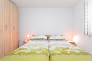 Posteľ alebo postele v izbe v ubytovaní Apartments Josip 1713