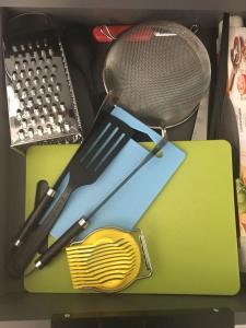 a knife and fork sitting on top of a box at Paljakka Villas in Kotila
