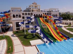 a water slide at a resort with a water park at ART Apartments - Pomorie in Pomorie