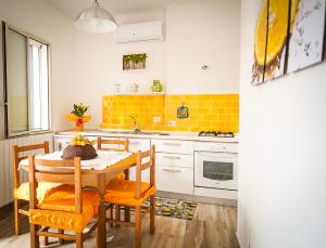 Kuchyňa alebo kuchynka v ubytovaní Baglio Reale Apartments