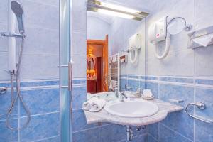Koupelna v ubytování Hotel Ostrea