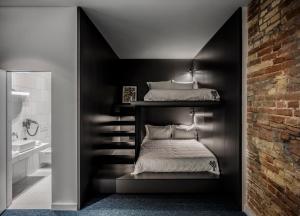 Postel nebo postele na pokoji v ubytování BURSA Hotel Kyiv