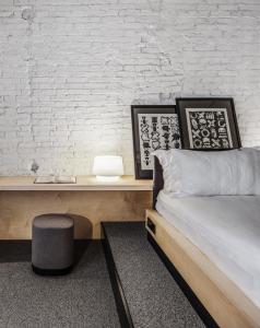 Postel nebo postele na pokoji v ubytování BURSA Hotel Kyiv
