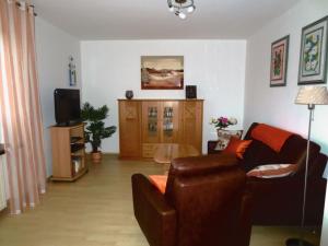 Μια τηλεόραση ή/και κέντρο ψυχαγωγίας στο Ferienhaus Beutnitz