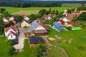 an aerial view of a small village with houses at Feriendorf Nehmeier in Haundorf