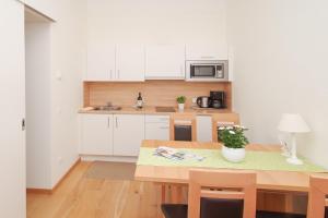 A kitchen or kitchenette at Residence Diana