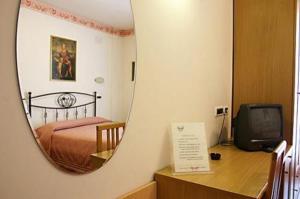 Postel nebo postele na pokoji v ubytování Albergo Bice
