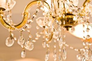 a close up of a chandelier with crystals at Villa Wellness Homes in Mötz