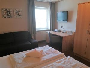 Postel nebo postele na pokoji v ubytování Hotel Landgasthof Euringer