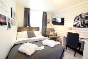 Postel nebo postele na pokoji v ubytování Lilis kleines Hotel