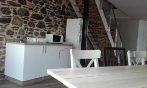 Kuchyň nebo kuchyňský kout v ubytování Albergue Monte Aro