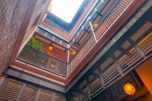 an overhead view of a building with a balcony at Calcutta Bungalow in Kolkata
