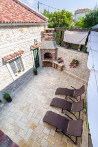 Patio nebo venkovní prostory v ubytování Stone House