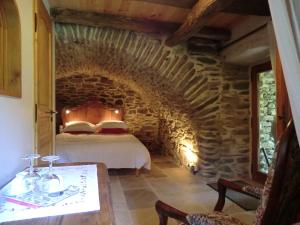 Postel nebo postele na pokoji v ubytování Transgardon B&B en Cévennes