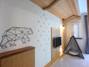 Televizors / izklaižu centrs naktsmītnē Kenting Dio Inn
