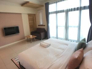 Televizors / izklaižu centrs naktsmītnē Kenting Dio Inn