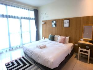 Gulta vai gultas numurā naktsmītnē Kenting Dio Inn
