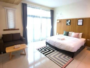 Gulta vai gultas numurā naktsmītnē Kenting Dio Inn