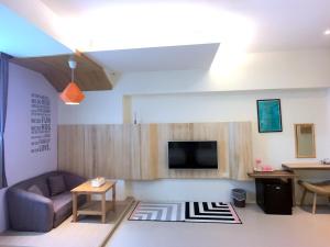Televizors / izklaižu centrs naktsmītnē Kenting Dio Inn