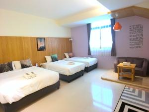 Gulta vai gultas numurā naktsmītnē Kenting Dio Inn
