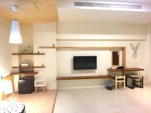 Televizors / izklaižu centrs naktsmītnē Kenting Dio Inn