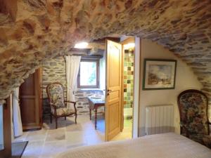 Postel nebo postele na pokoji v ubytování Transgardon B&B en Cévennes