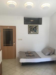 Postel nebo postele na pokoji v ubytování Villa Perković